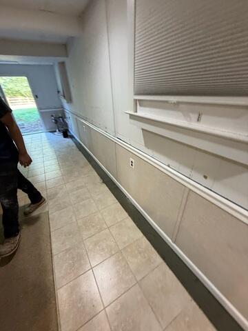 Lastly, our team added EverLast Wall Panels to replace water-damaged drywall with a waterproof, mold-resistant solution that protects against future moisture and enhances the basement's appearance.