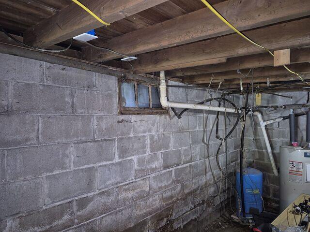 Before - Bowing Cinder Block Foundation Wall