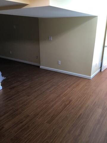 After the homeowner confirmed our system was working perfectly during a heavy rain, they allowed us to install our ThermalDry floor system. These planks are fully waterproof and designed with an interlocking structure that creates a thermal break between the concrete and the finished floor surface. This design not only prevents moisture from seeping through but also keeps the floor warmer underfoot. The planks are durable, easy to install, and provide a smooth, comfortable surface that allows homeowners to finish their basement without worrying about moisture or cold spots.