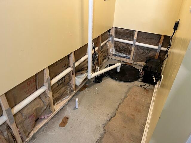 This photo, also taken upon the initial inspection, shows the worn down sump pump. It was receiving too much sediment, causing it to completely break down in less than a year.