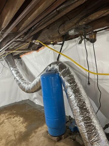 CleanSpace® Wall System: A bright, durable vapor barrier was installed along all basement walls. This system stops water vapor from passing through the foundation while directing any wall seepage into the drainage system below.

WaterGuard® Interior Drainage System: Installed around the interior perimeter of the basement floor, WaterGuard collects groundwater and wall seepage, channeling it efficiently to the sump pump without ever clogging.