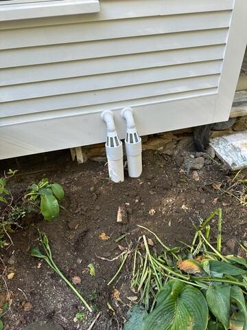 IceGuard® Discharge Line Protection: IceGuard fittings were added outside the home to prevent the discharge line from freezing or clogging during Plattsburgh's harsh winters.