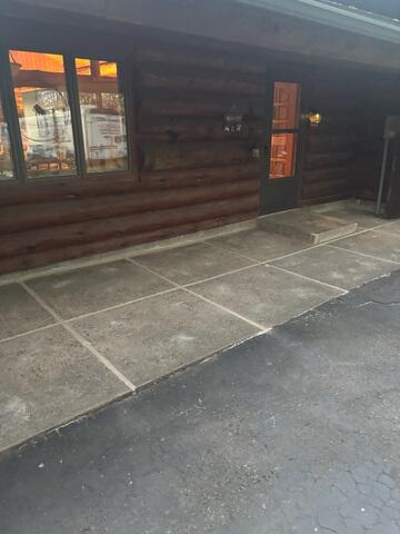After: Our Foreman, Bryce, and his crew successfully lifted the concrete back into place.