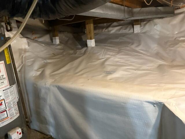 The crew insulated the crawl space and fully encapsulated it with our CleanSpace vapor barrier.