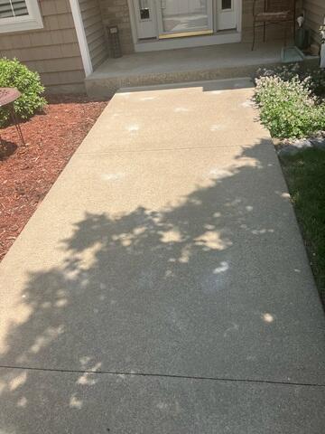 After our crew lifted the concrete slabs and sealed the joint.
