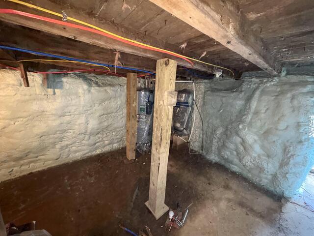 Spray Foam Insulation on Stack Stone Foundation