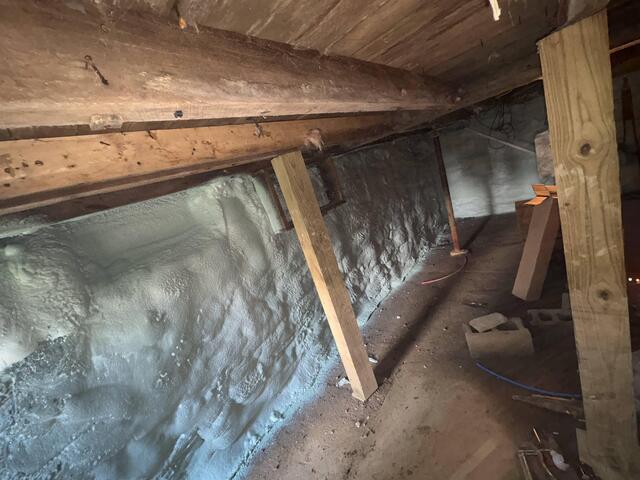 Spray Foam Insulation on Stack Stone Foundation