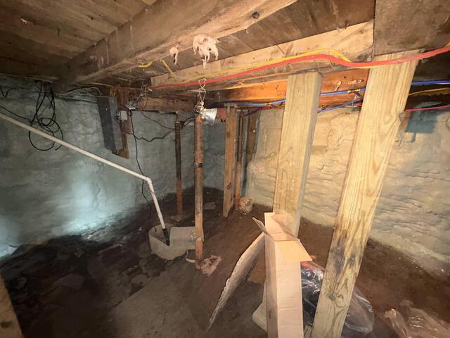Spray Foam Insulation on Stack Stone Foundation