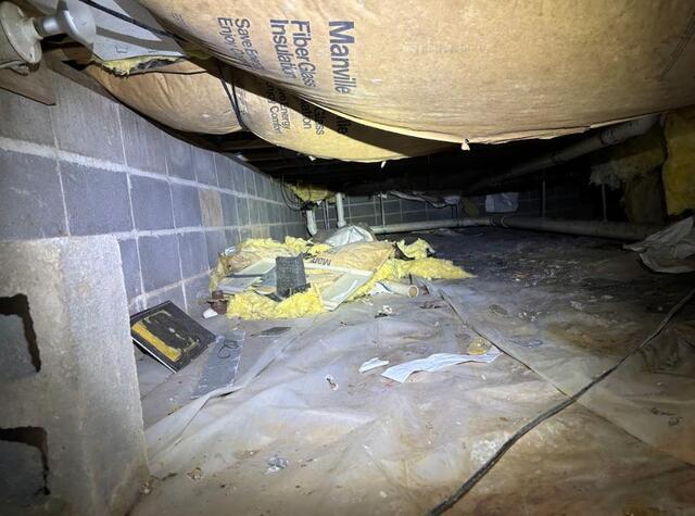 Another look at the rough conditions of the previous liner and crawl space in general.