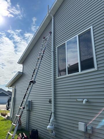 The exterior of the home after our radon mitigation system was installed.