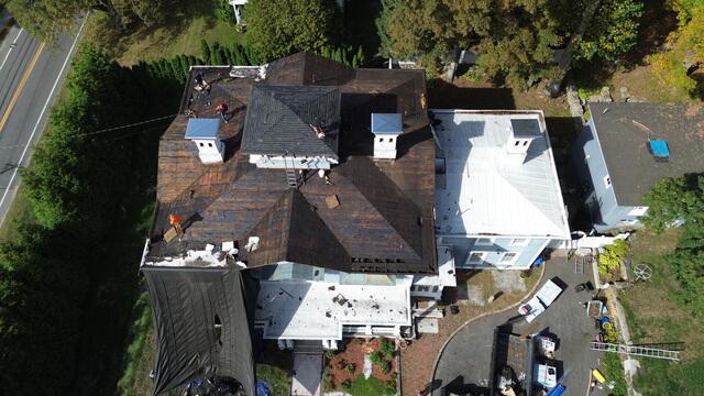 After the full removal, the roof was completely stripped down to the bare decking. This stage allowed our team to inspect the wood surface and address any areas weakened by moisture. Stripping the roof gave us a clean foundation to build on.