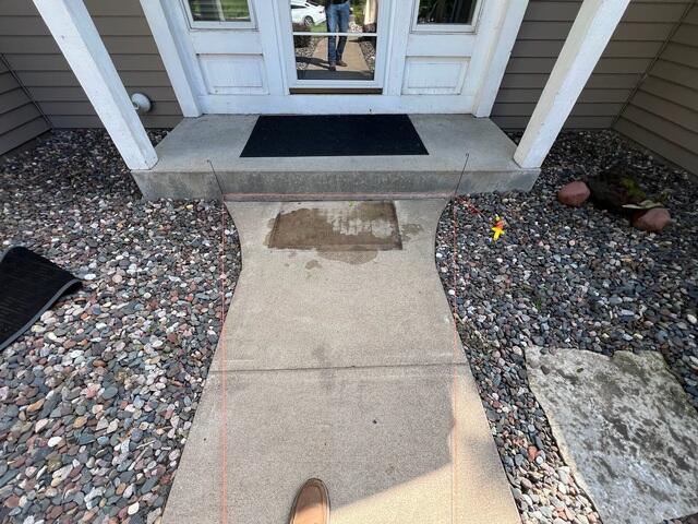 The walkway before it was lifted and the joints were sealed