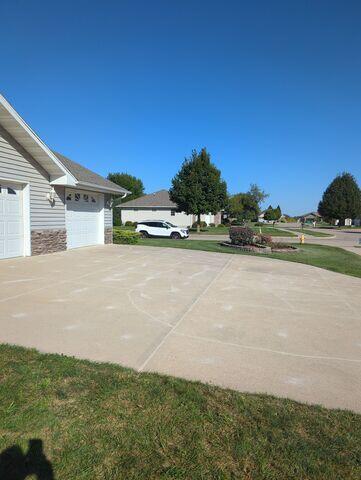After our crew lifted and leveled the driveway