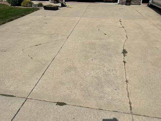 The driveway showed signs of settlement and cracks have begun forming