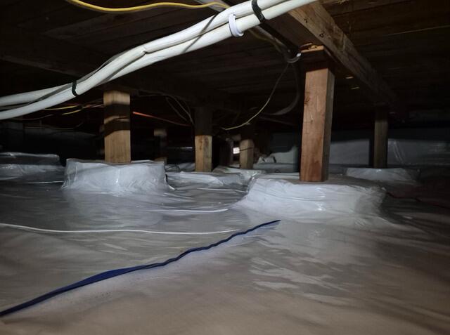 Our CleanSpace system is installed on the footing of each wooden post to ensure no water can be absorbed into the wooden posts and cause wood rot and sagging floors above.