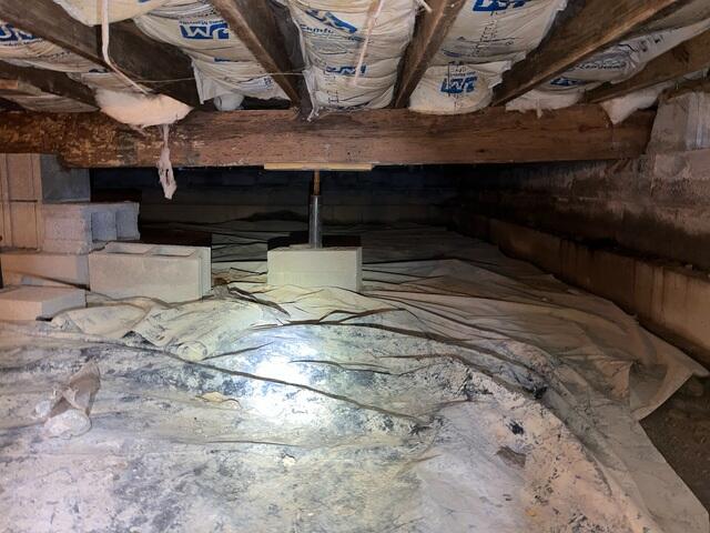 This photo shows the picture our inspector took in December, when the weather was dry. Take a look at the floor of this photo, then scroll to the next photo in this case study, (taken from the exact same angle) after we finished the project in March during the rainiest season of the year.