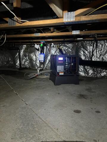 Even after fixing the pump, the crawl space air was too humid, so we installed our powerful SaniDry Sedona Dehumidifier to complete the moisture defense.