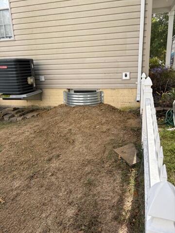 Completed exterior waterproofing around the window well