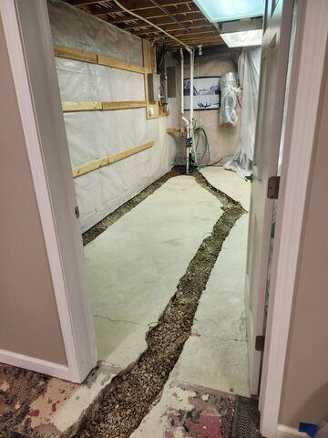 During: Our Foreman, Lane, and his crew secured WaterGuard throughout the basement.