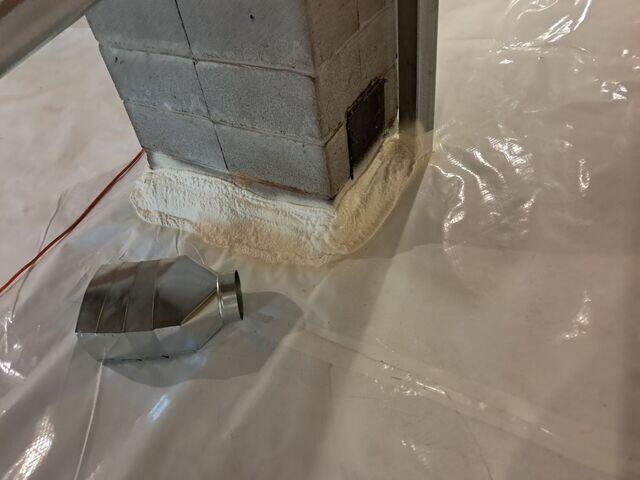 CleanSpace® Encapsulation System: A durable, 20-mil reinforced vapor barrier was installed across the entire floor and walls, sealing out ground moisture and humidity. The bright white liner instantly improved the space's appearance and usability.

Closed-Cell Spray Foam Insulation: Applied to crawl space walls, the foam provides insulation and an additional moisture barrier, helping regulate temperature and reduce energy loss.