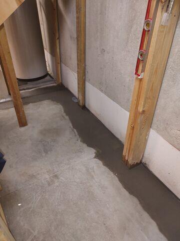 WaterGuard® Interior Drainage System: Installed along the interior perimeter of the basement floor, WaterGuard captures groundwater seepage from the walls and floor joint, directing it safely to the sump pump. Its clog-resistant design ensures long-term reliability.