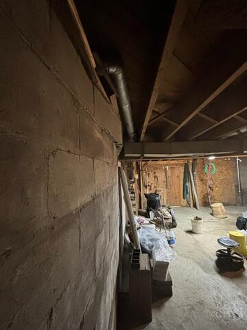 Damaged cinder block foundation wall in Littleton, Maine.