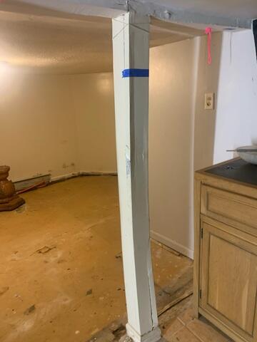 Before this project, the basement was showing clear signs of structural issues that needed to be addressed.