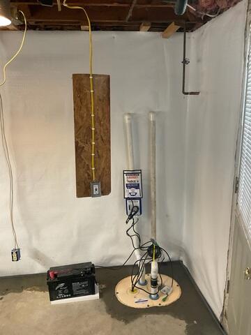 The TripleSafe Sump Pump was installed to ensure reliable water removal, offering three layers of protection, including a battery backup, to keep the basement dry even during heavy rain or power outages.