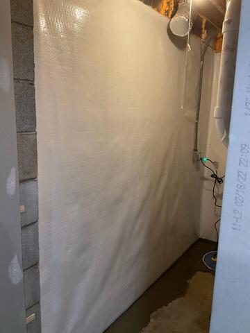 CleanSpace Wall Panels were installed to create a durable, moisture-resistant barrier along the basement walls. These panels prevent humidity and vapor from entering the space, improving overall air quality and contributing to a cleaner, more finished appearance.