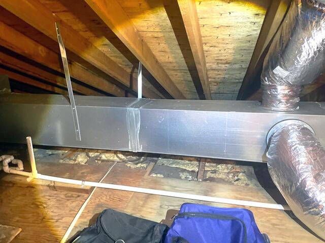 Comparing the thermal image with the photo of the leaky ducts shows that the connections aren't properly sealed, allowing air to escape into the attic. Essentially, the homeowner is paying to cool the attic as valuable cool air is wasted.