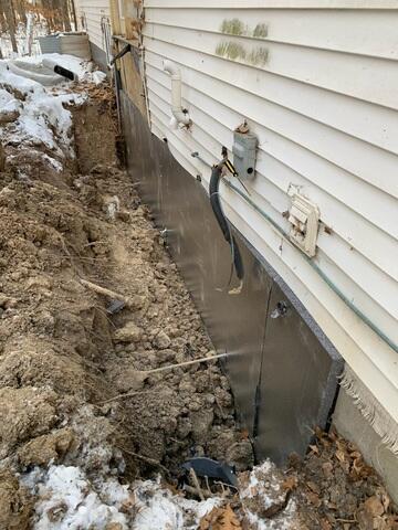 During: Our Foreman, Luis, and his crew secured the foundation repair products throughout the basement.