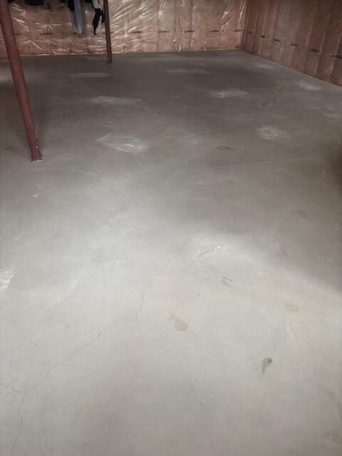 The entire basement slab has been successfully lifted, stabilized, and leveled. The injection points have been patched, and the floor is now safe