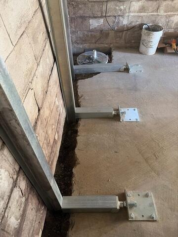 This was what the wall looked like before we straightened it back out.