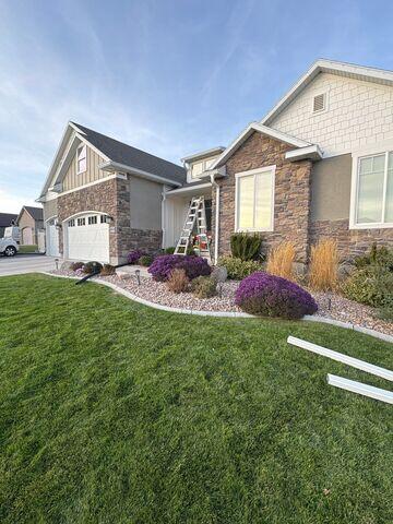 working on gutters and downspouts