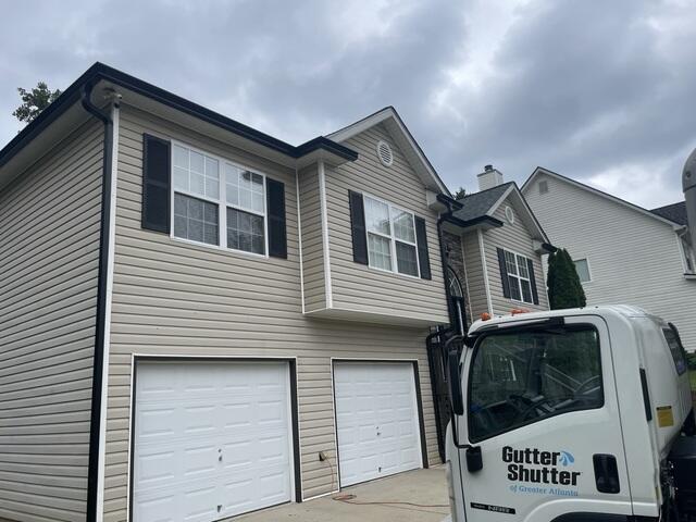 The team has completed the Gutter System Replacement. The new gutters in Alomond really complement the house's trim and make the exterior stand out.