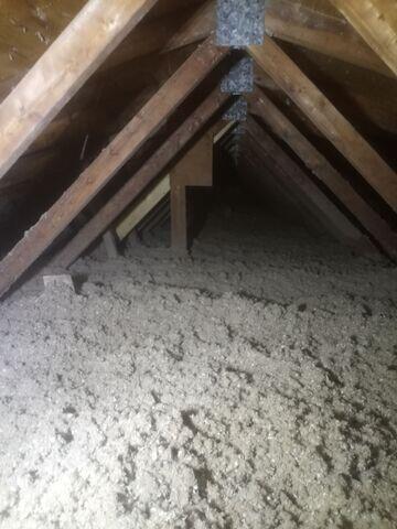 Attic insulated with TruSoft cellulose for optimal comfort and energy efficiency.