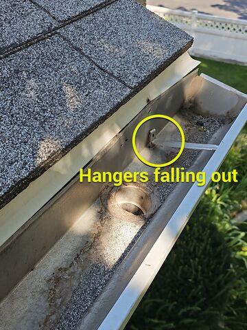 The buildup caused the hangers to fall out