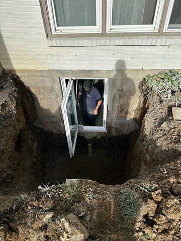 After we cut the wall out with a very large concrete saw, we then fitted the opening with the 35x54 window.
