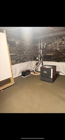 WaterGuard® Interior Drainage System: Installed along the basement perimeter to collect water seeping from the walls, wall‑floor joint, and under the slab. It safely directs water to the sump system.
TripleSafe™ Sump Pump System: Provides triple‑layer protection with a primary pump, secondary high‑volume pump, and a battery backup to keep the basement dry during storms and power outages.
ThermalDry® Drainage Matting: Laid across the floor to allow any under‑slab water to flow freely toward the WaterGuard® drainage system while providing an insulating barrier beneath the new concrete slab.
SaniDry™ High‑Efficiency Dehumidifier: Installed to control humidity, prevent musty odors, and maintain healthy air throughout the basement.