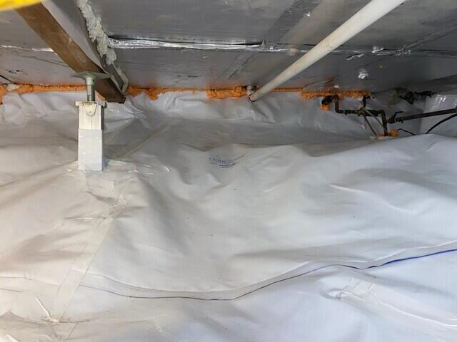 The crawl space is now fully encapsulated with our CleanSpace vapor barrier and supported by our SmartJack stabilizing system.
