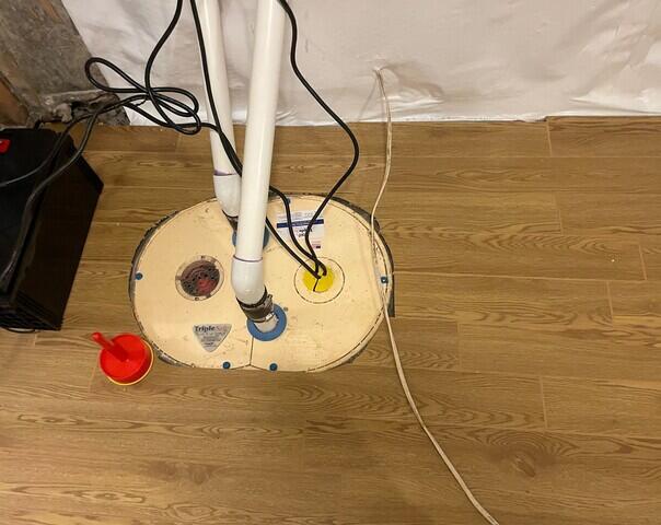 The TripleSafe sump pump sends all of the collected water out of the home through the two discharge lines.