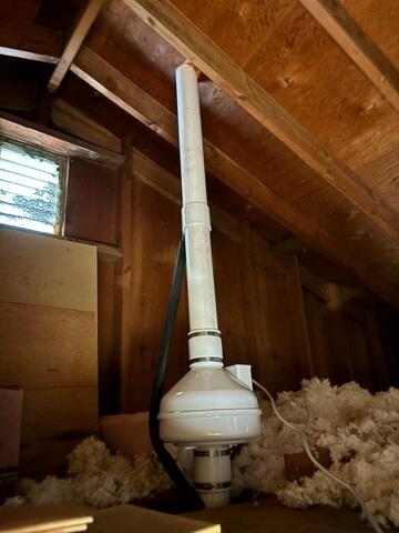 The fan was installed in the attic and is connected to the footing and the roofline