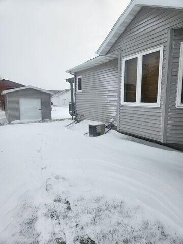The exterior of the home before the radon mitigation installation