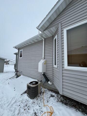 The fan installed at the exterior of the home to expel the radon gas