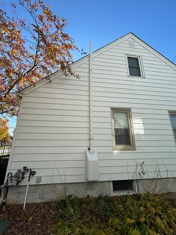 The exterior where the fan is located to expel the radon gas