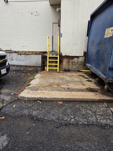 Uneven concrete at the loading dock of a grocery store in Adams, MA