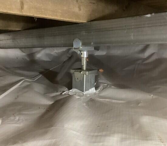 The SmartJack Stabilizing System has reinforced support in the crawl space.