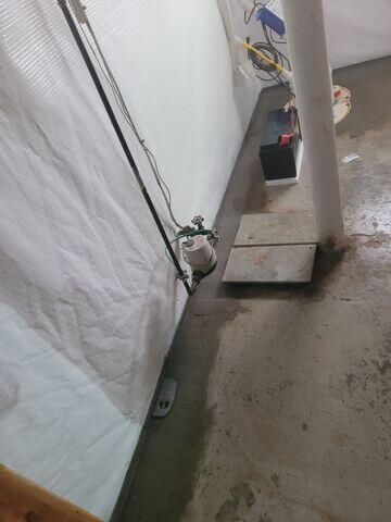 WaterGuard was installed along the perimeter of the basement to direct any seeping water to the sump pump for removal.