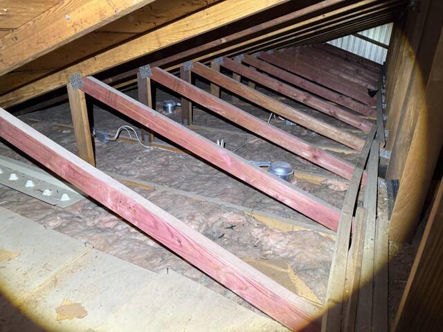 Attic with inefficient fiberglass batt