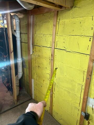 Before: Our Design Specialist, Sean, recommended installing GeoLock Wall Anchors on the cracked walls.